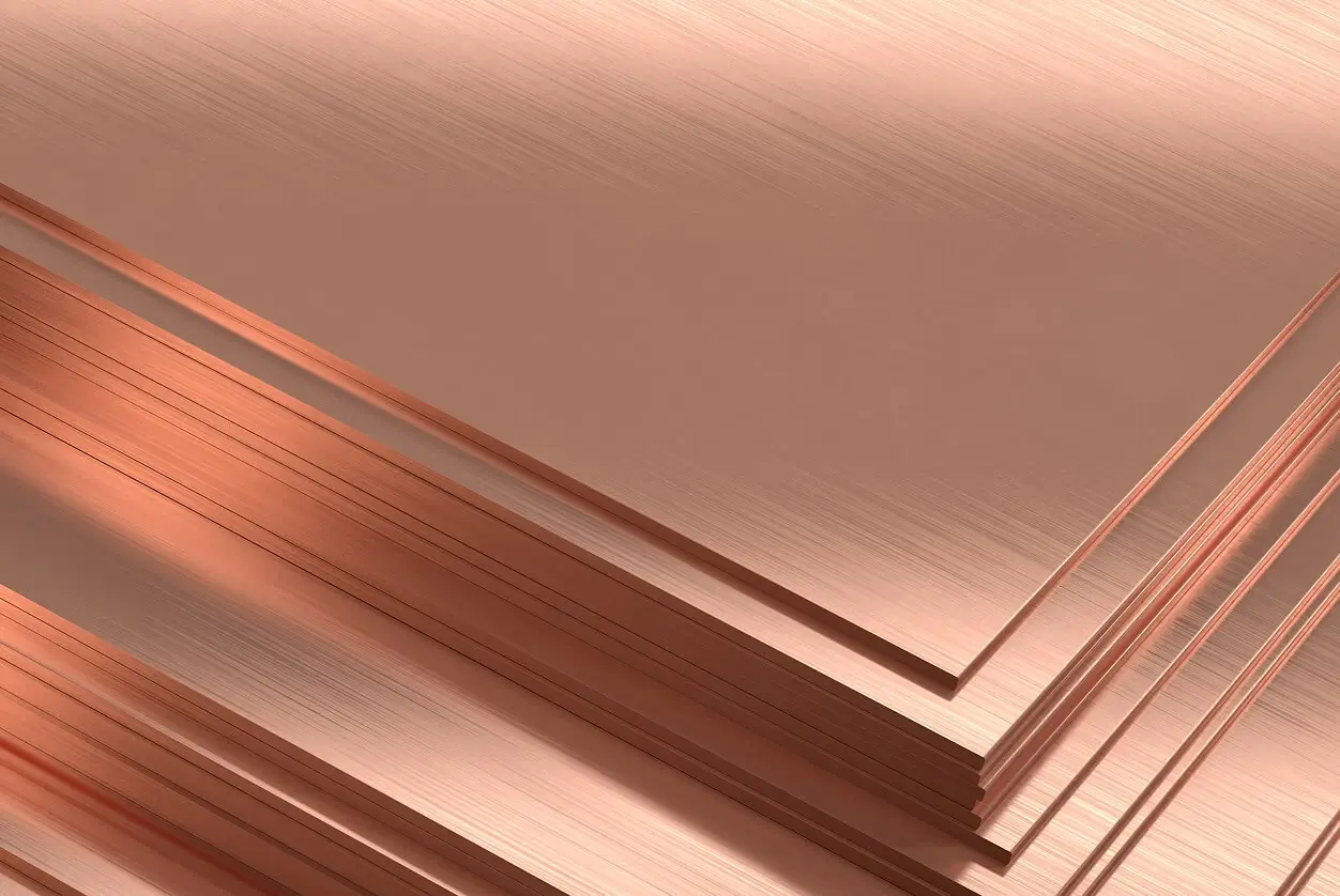 Stacked copper alloy sheets and plates with a brushed surface finish.